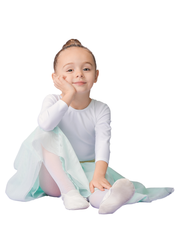 Young girl in ballet costume sitting on floor with dreamy look